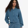 Sweat à capuche court zippé bio - Indigo délavé