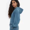 Sweat à capuche court zippé bio - Indigo délavé