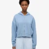 Sweat à capuche court zippé en coton bio - Bleu bord de mer