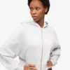 Sweat à capuche court zippé en coton bio - Mélange neige